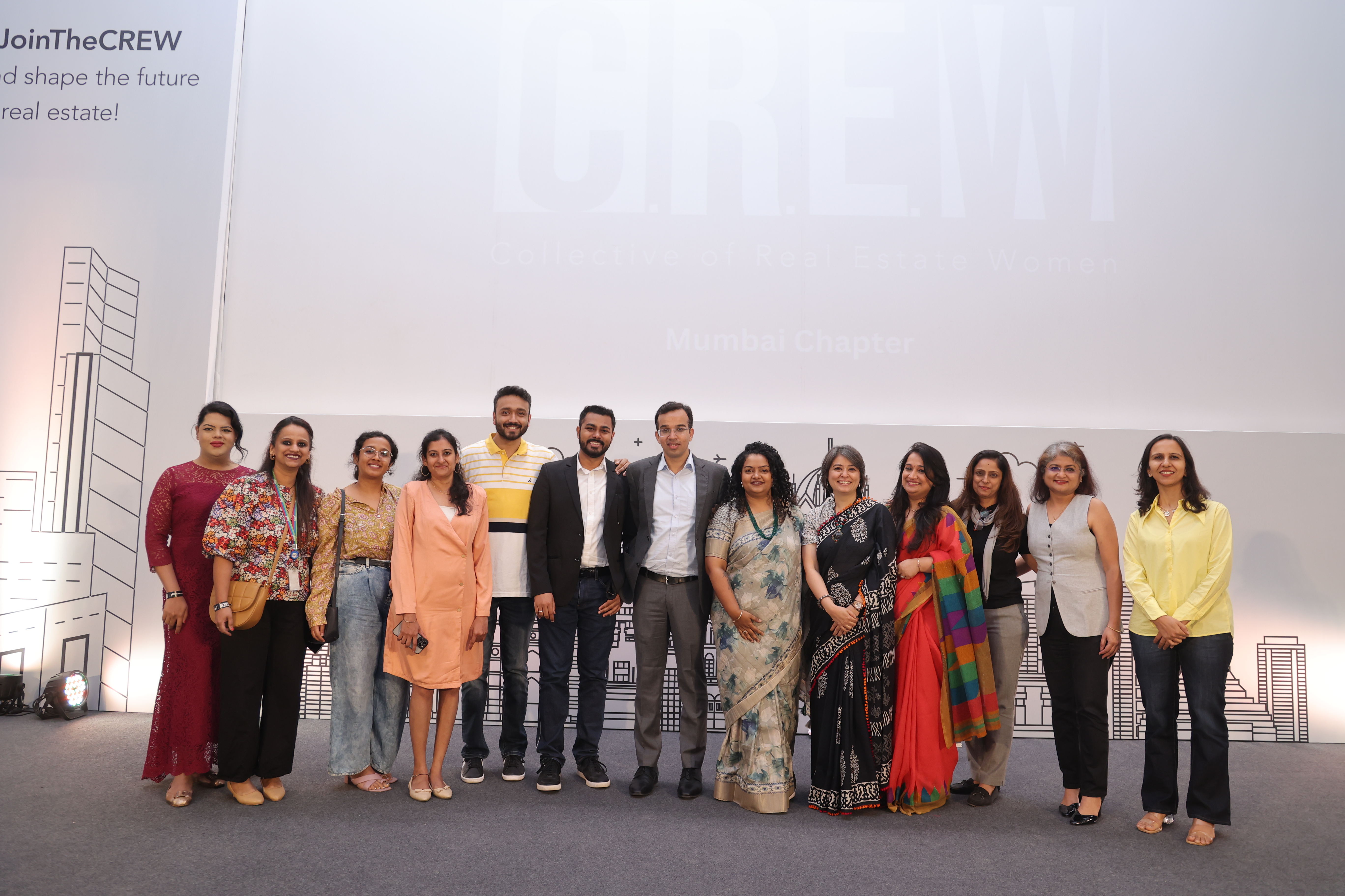 Event attendees posing for a group photograph
