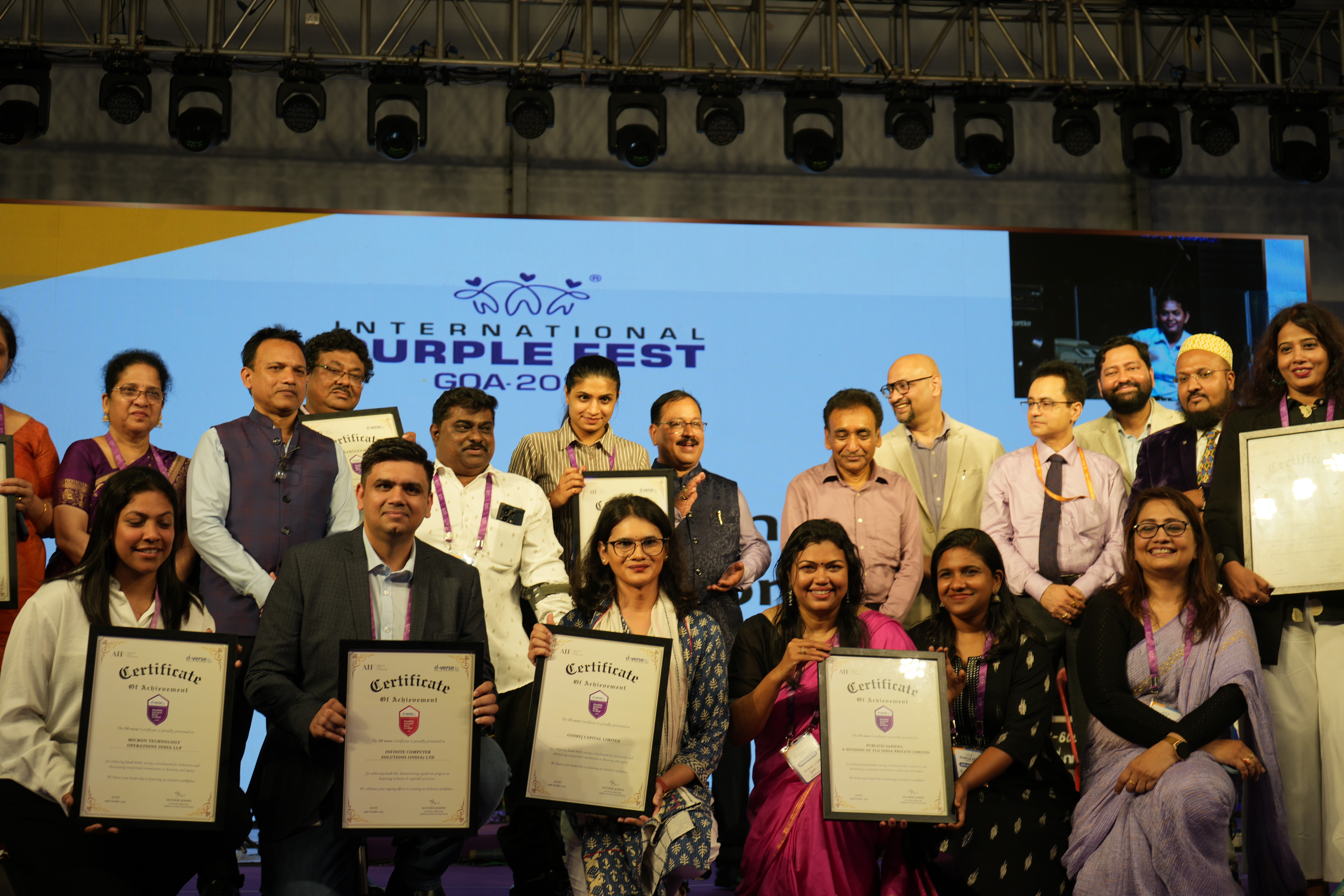 Maira accepting the award on stage