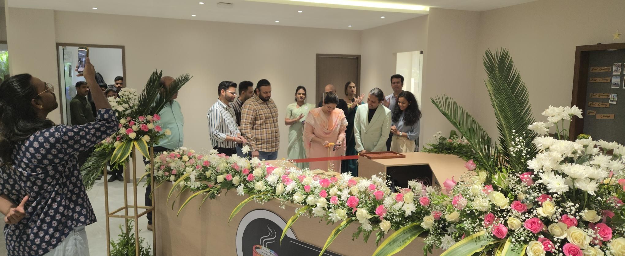A photograph of people inaugurating one of GPL's Equali-tea cafe.
